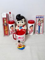 Marks Big Boy Collectables. Watch, Pen, Coffee Cup, Surfer, 2 Waterbottles, And A Doll.