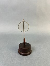 Vintage Magnifying Glass On A Wood Stand.