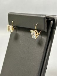 14K Yellow Gold And Faceted Emerald Cut Clear Stone Pierced Earrings