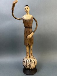 Hand Carved With Wire Arms Man On A Ball.