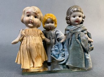Vintage Porcelain Figurines Made In Japan Attached To A Mirror.