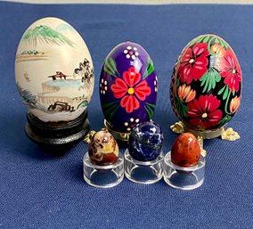 3 Hand Painted Eggs  And 3 Egg Shaped Stones On Holders