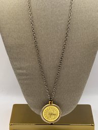 Gold Tone Coin Medallion On A Silver Tone Chain
