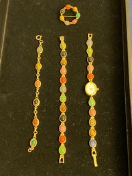 Set Of Stone Bracelets And A Broach And An Oleg Cassini Watch An