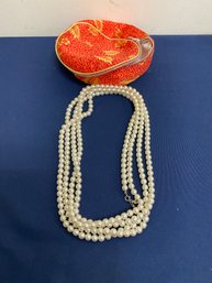 Long String Of Faux Pearls  With Jewelry Bag