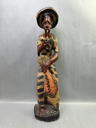 Wood Carved Figure Of A Fisherman With A Fish