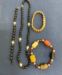 3 Bracelets And 1 Necklace