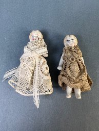 2 Antique Bisque Dolls With Handmade Lace Dresses.
