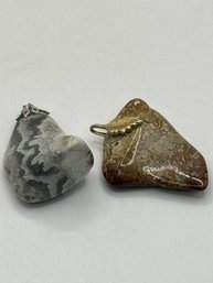 2 Polished Rock Pendants
