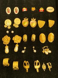 12 Pair Of Clip On Earrings And 4 Pins