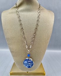Silver Tone Chain With Blue Locket