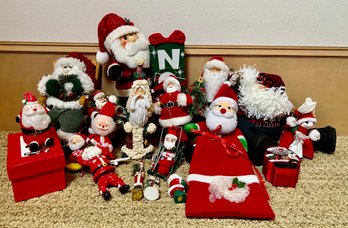 Grouping Of Santa Ornaments And Santa Decor