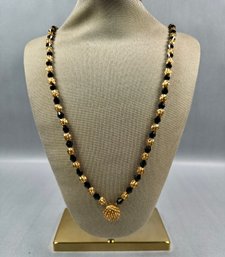 Gold Tone And Black Beaded Necklace With Pendant
