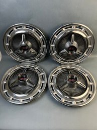 4 SS Hubcaps.