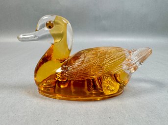 Plastic Duck With Amber Liquid And Floating Gold Tone Coins