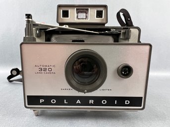 Vintage Polaroid Automatic 320 Land Camera.