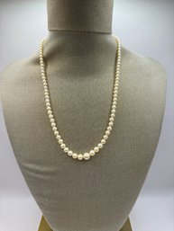 Strand Of Cultured Pearls With 14k Clasp.