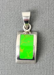 Sterling Silver And Green Stone Pendant.