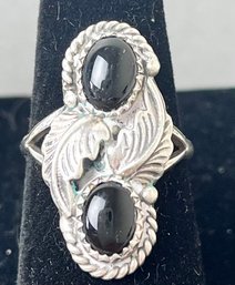 Sterling Silver Ring With Black Stones.