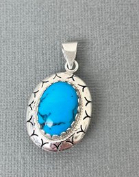 Sterling Silver And Possible Turquoise Pendant.