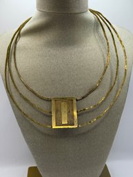 Gold Tone Sculpture Necklace