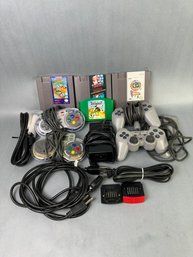 4 Nintendo Games, 4 Controllers, Plus 2 Memory Packs And Cords