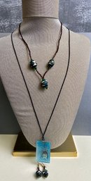 Bead Necklace And Translucent Blue Pendant On Leather Strong