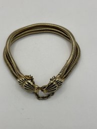 Gold Tone Mesh Bracelet With Shell Motif On Closure