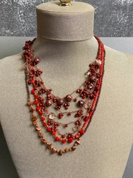 2 Brown Bead Necklaces And 1 Red Bead Necklace