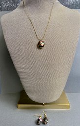 Gold Colored Chain With Round Pendant