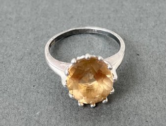 Sterling Silver Ring With Yellow/Peach Colored Stone