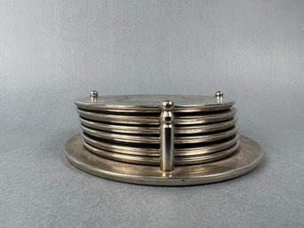 6 Silver Plate Coasters With Holder.