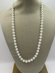 Strand Of Faux Pearls