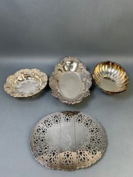 3 Silver Plate Dishes And A Expandable Trivet.