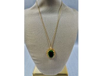 Gold Tone Chain And Pendant With Green Stone
