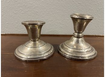 2 Weighted Sterling Mismatched Candleholders.