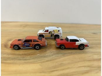 Three Hot Wheels Cars