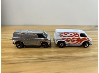 Two Hot Wheels Vans