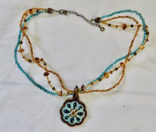 Avon Teal & Topaz Medallion