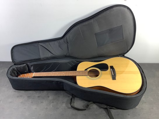 Yamaha F325D Guitar With Backpack Style Case.