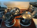 8 Pieces Of Revere Ware Including Lids