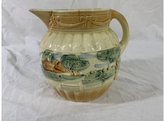 Scenic Pitcher With Raised Decorations