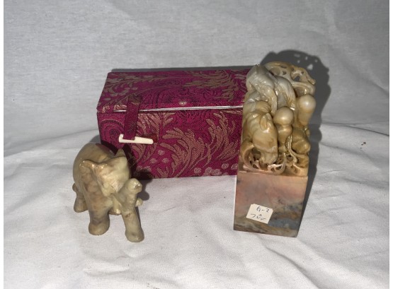 Two Carved Hard Stone Items Including A Stamp And Elephant