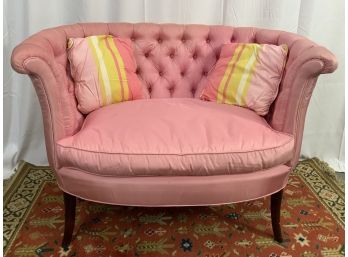 Pink Settee With Silk Upholstery With Two Pillows.
