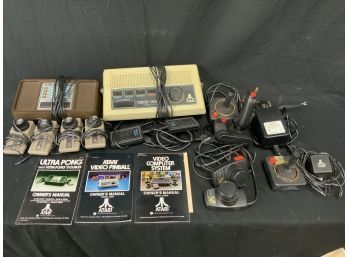 Atari Accessories. Including Video Pinball Model C 380. Ultra Pong Atari. Manuals, Joysticks, Etc