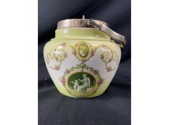 Biscuit Jar. Medallion Of Womens Heads, Woman And Child. Green & Ivory Color. Silver Plated Lid & Bail.