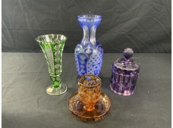 4 Varying Cut To Glass Decorative Pieces. Green, Blue, Purple, And Orange.