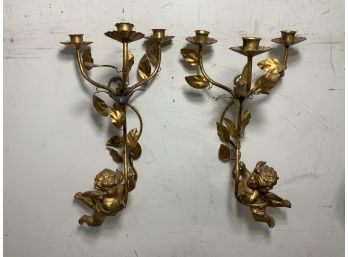 Pair Of Brass Cupid Angel Sconces.