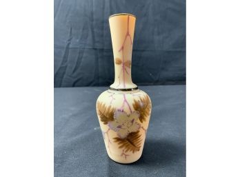 Small Ivory Vase. Background With Brown Leaves & Blue Flowers.