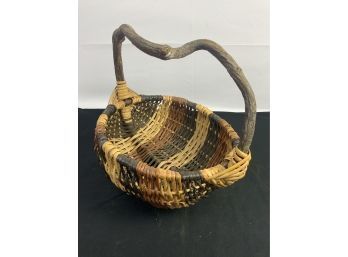Branch Handle Woven Basket. Multi Colored.